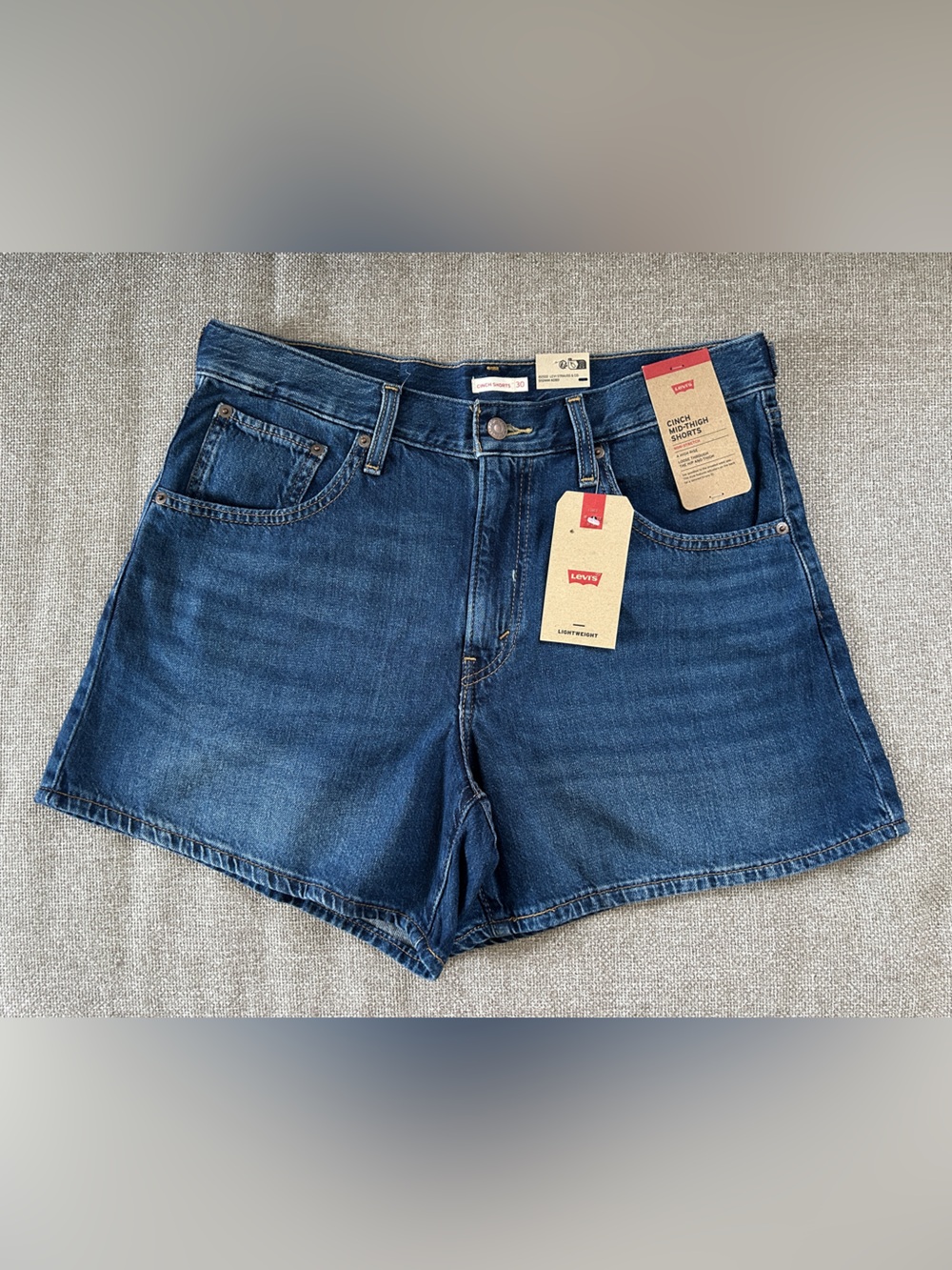 Levi's High-Rise Mid-Thigh Shorts in Dark Blue Denim